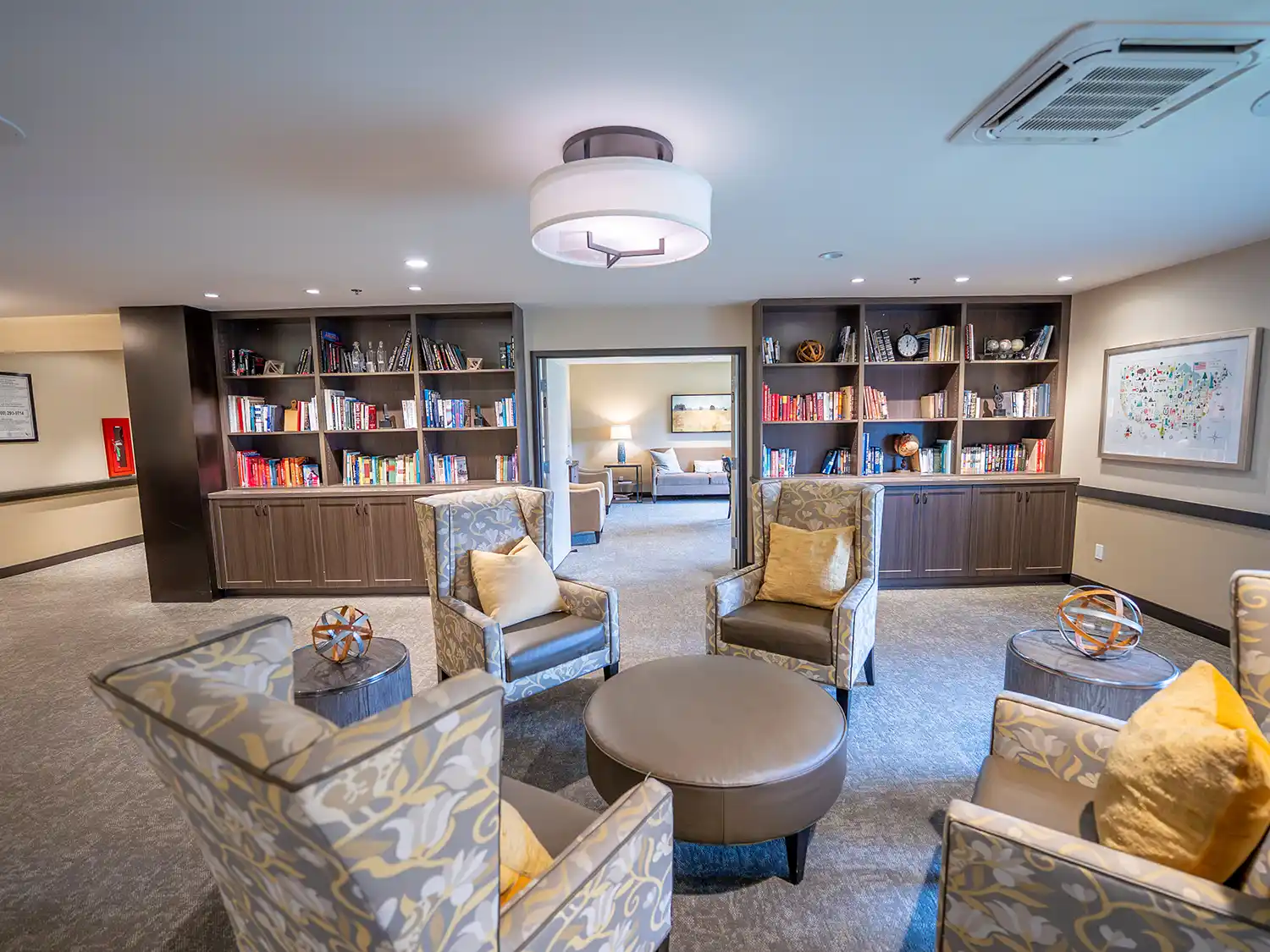 Comfortable senior living library and lounge area for assisted living and memory care in Visalia CA