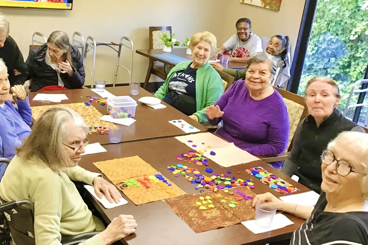 Residents enjoy group activities while families plan ahead with a memory care waitlist